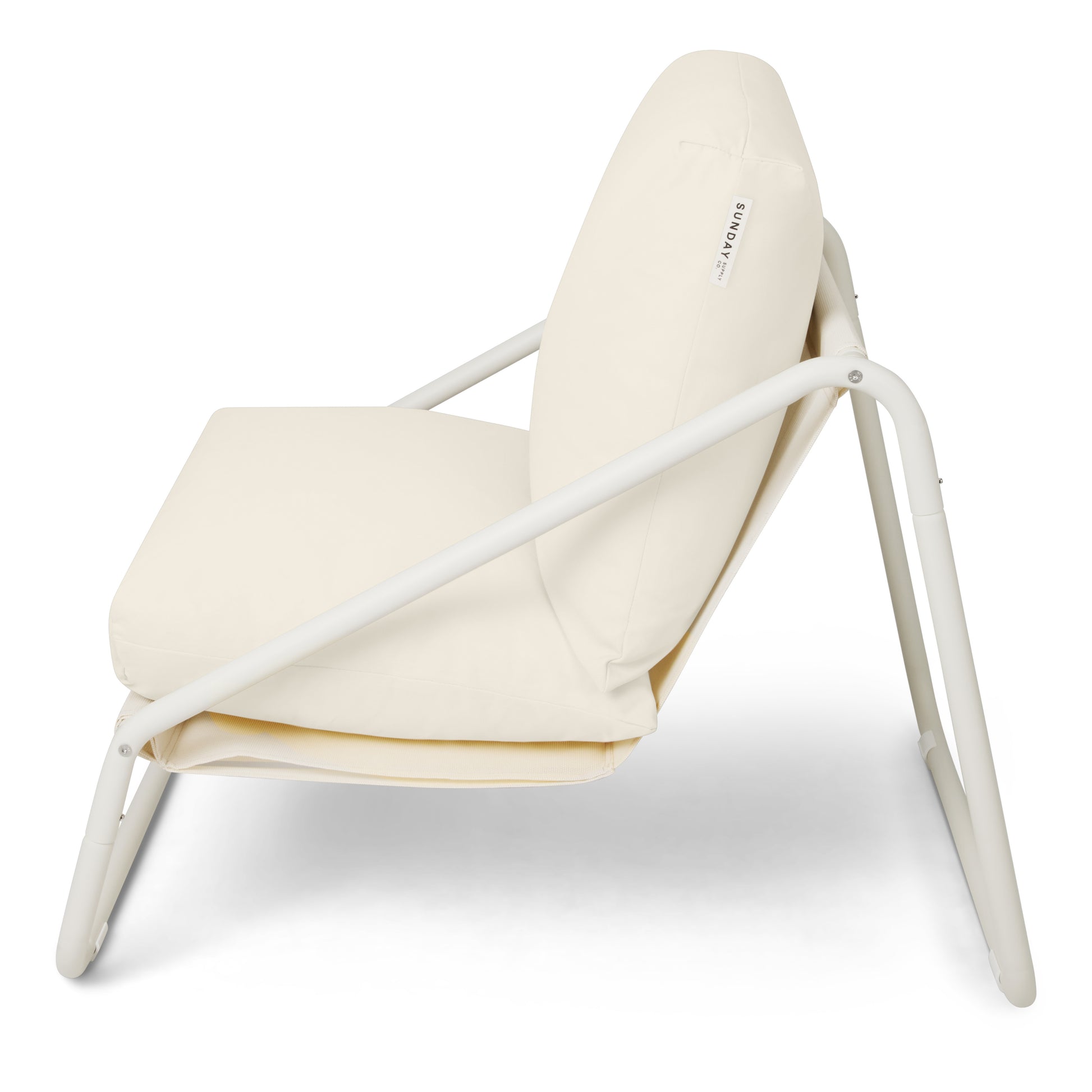 Modern chair with white frame and beige cushion on a white background